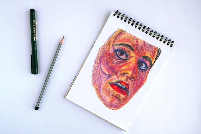 A sketchbook drawing from imagination with fun colored pencils